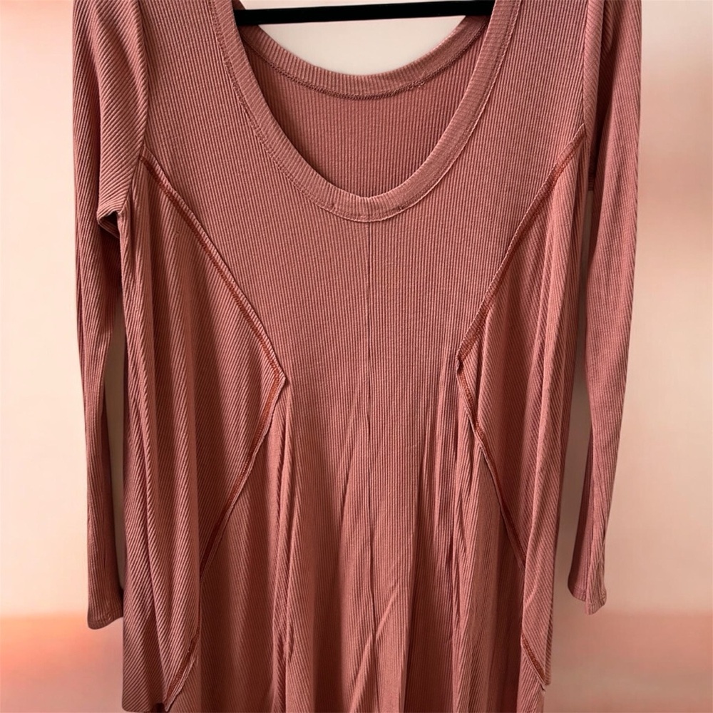 Miracle Berry drop shoulder handkerchief hem top